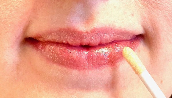 lips with golden honey