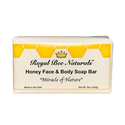picture of our soap, with white and yellow logo 5oz bar, made in the usa